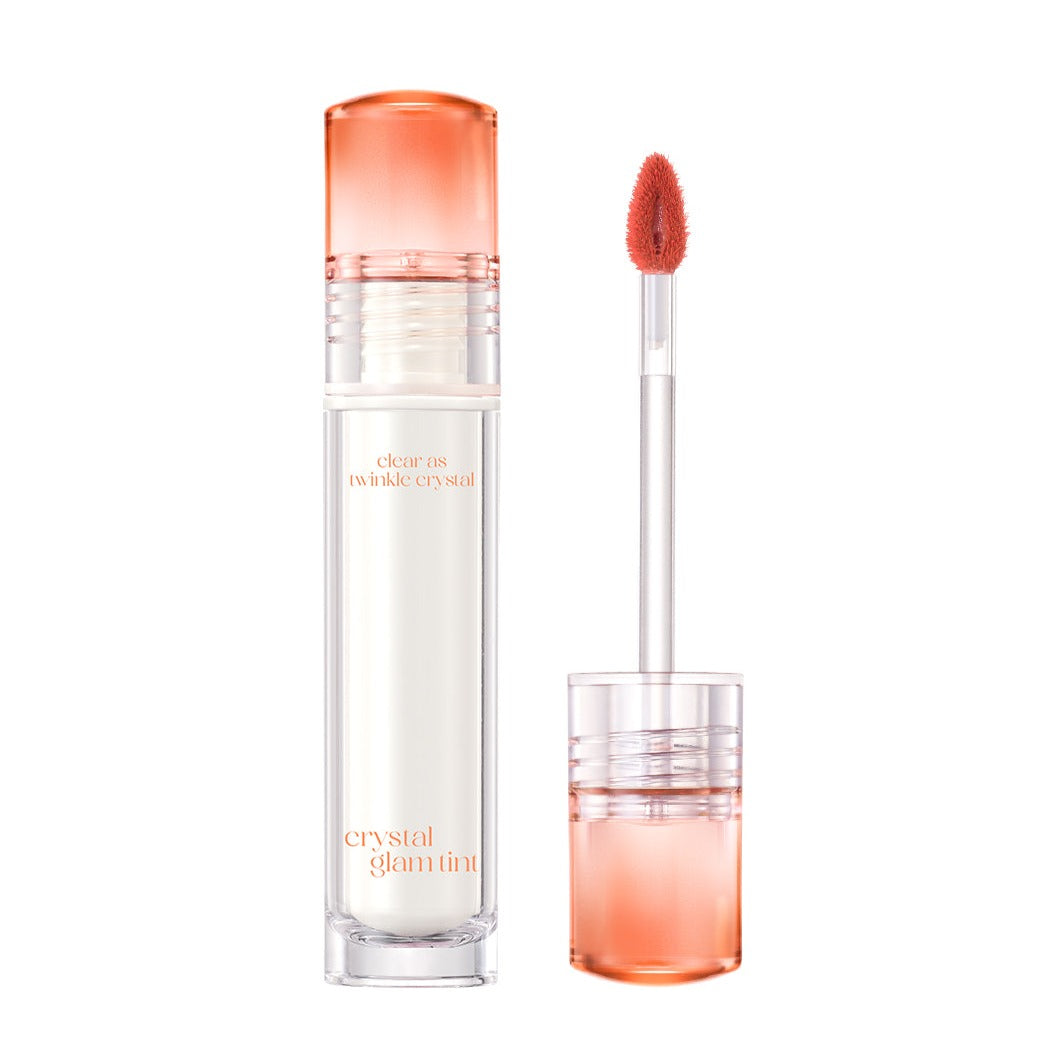 Clio Crystal Glam Tint lip tint in a clear tube with a doe-foot applicator, showcasing the glossy, shimmering lip color.