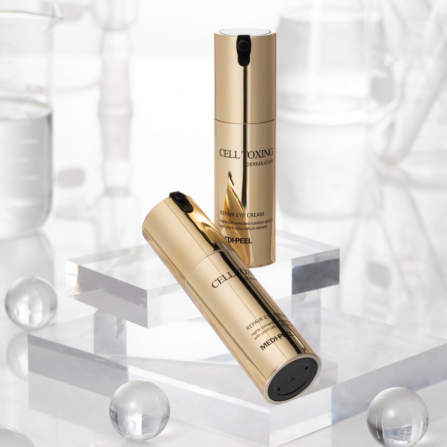 Medipeel+ Cell Toxing Dermajours Repair Eye Cream 30ml in a sleek tube, designed to reduce puffiness and dark circles around the eyes.