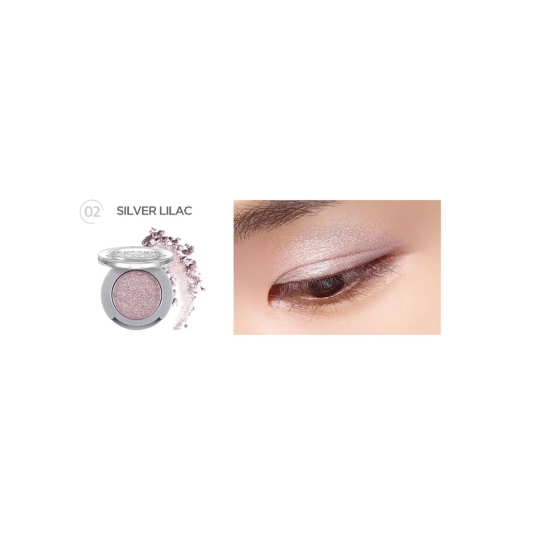 Klavuu Urban Pearlisation Sparkle Eyeshadow in Silver Lilac, a shimmery eyeshadow with a silver-lilac hue, showcased on a model's eyelid.