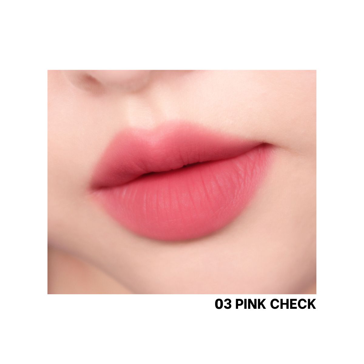 Peripera Over Blur Lip Tint in pink check packaging, showcasing the vibrant pink shade and sleek cosmetic tube.