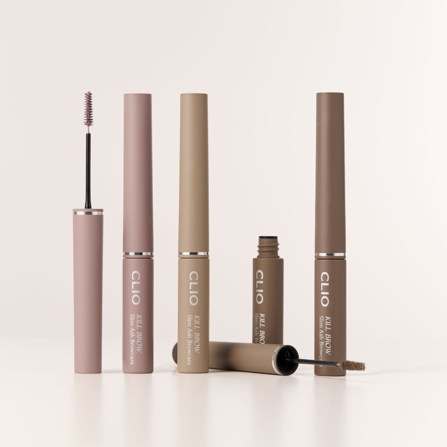 Clio Kill Brow Slim Ash Eyebrow Cara showing a sleek brow grooming tool with ash-toned product for defining eyebrows.