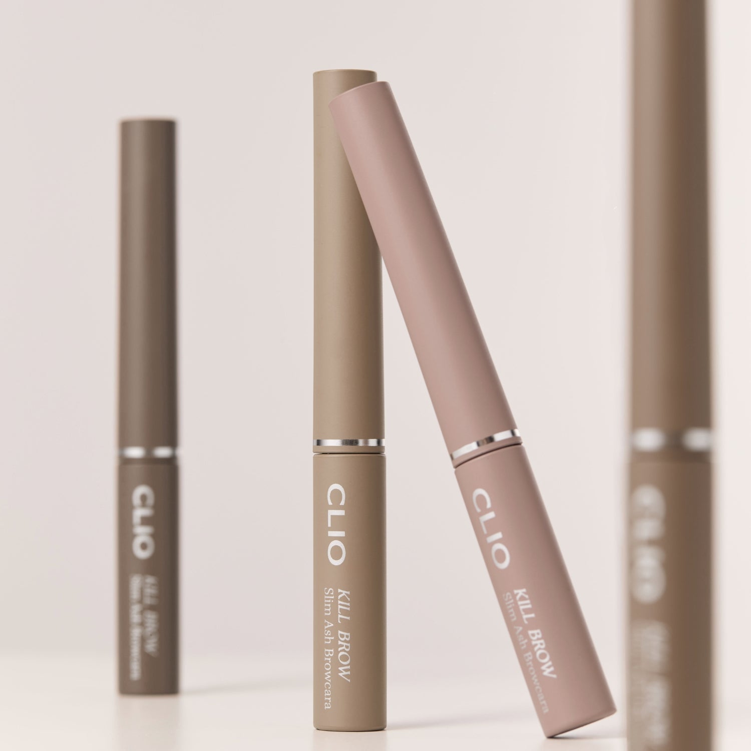 Clio Kill Brow Slim Ash Browcara with angled brush for precise eyebrow shaping and natural ash-toned brow enhancement.