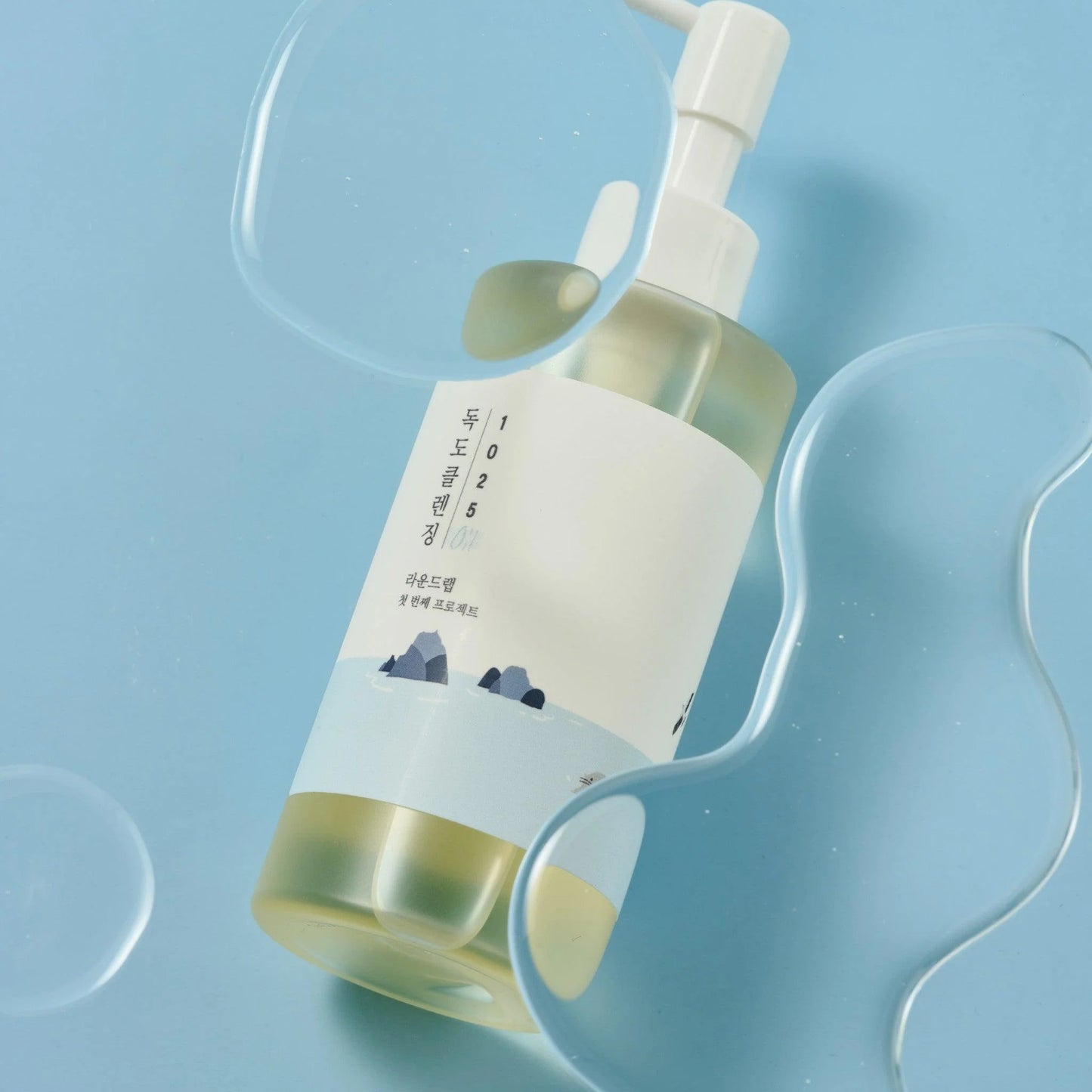 Round Lab Dokdo Cleansing Oil 200ml in a clear bottle with a pump, designed for gentle oil cleansing.