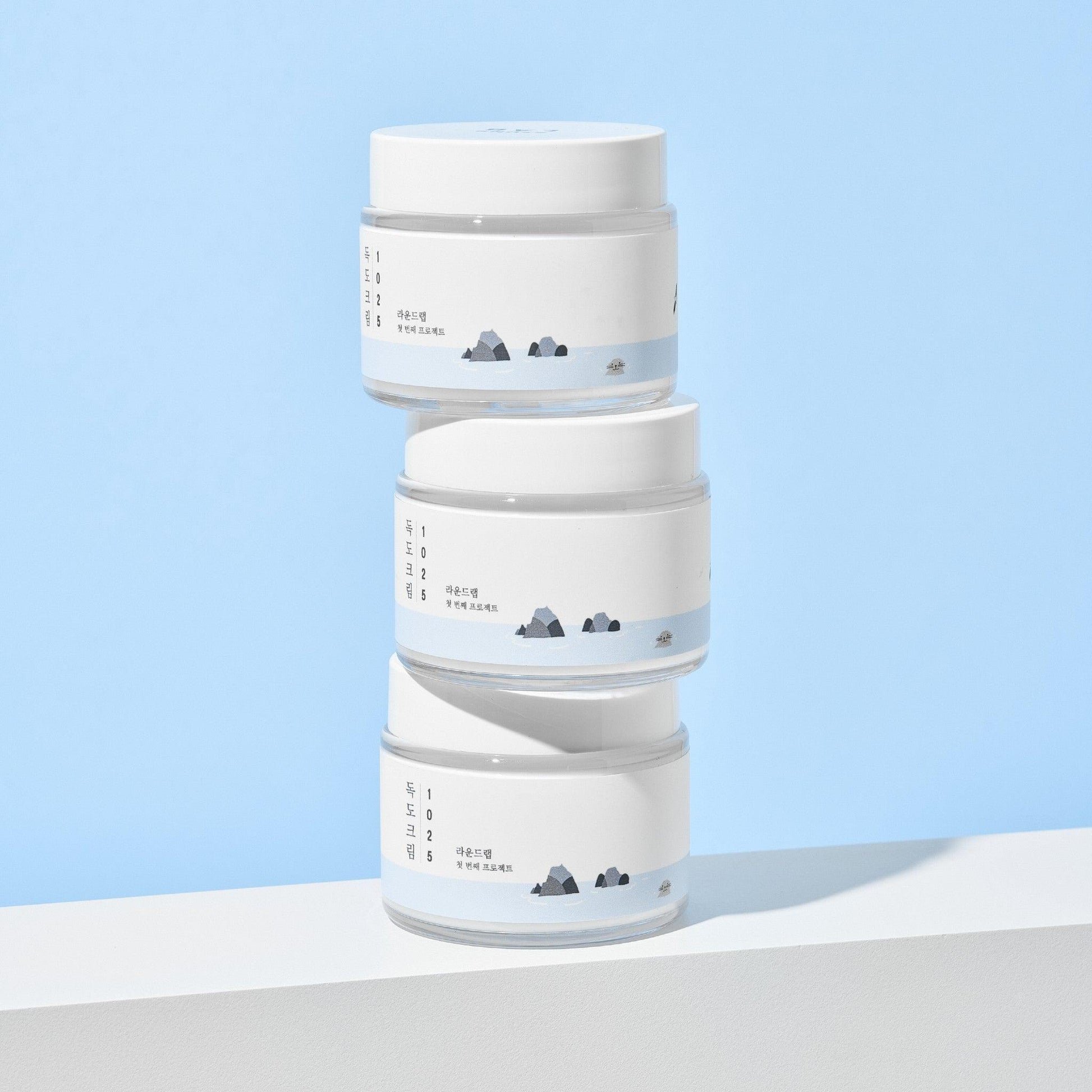 Round Lab Dokdo Cream face moisturizer in an 80ml jar, with a smooth, creamy texture and minimalist packaging.
