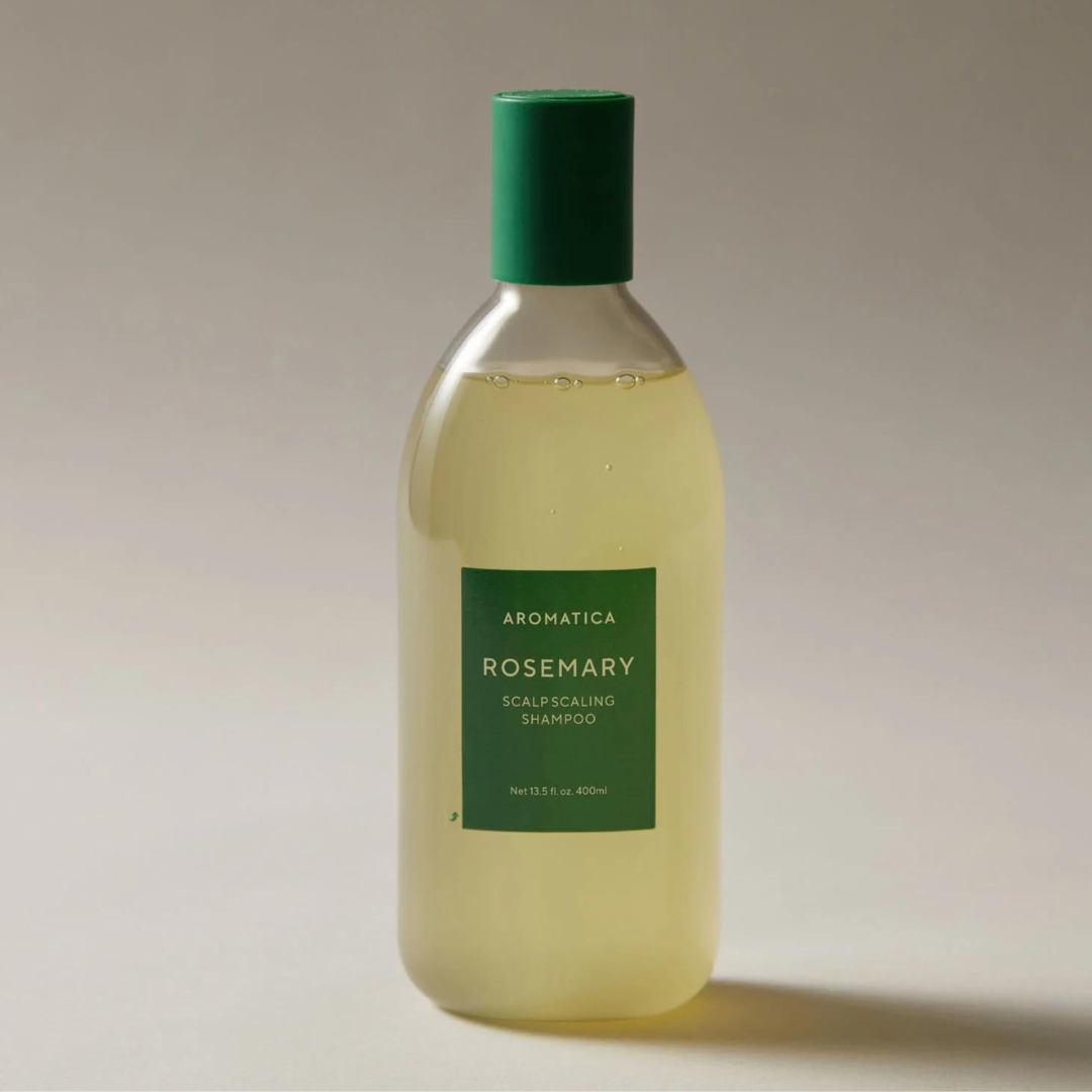 Aromatica Rosemary Scalp Scaling Shampoo bottle with label, showing natural ingredients and herbal formulation for healthy scalp.