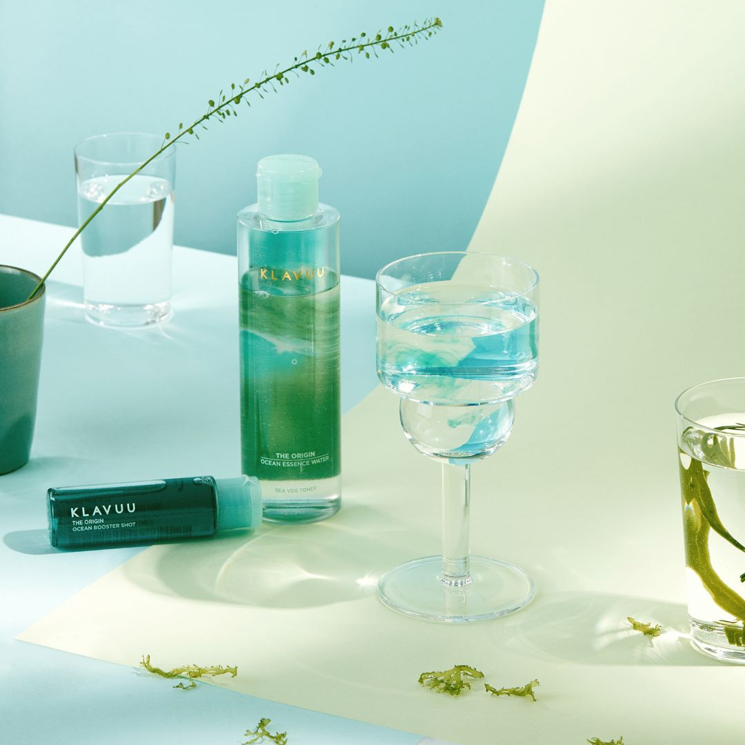 Klavuu The Origin Ocean Essence Water and Ocean Booster Shot toner bottles, featuring clear liquid in sleek packaging.