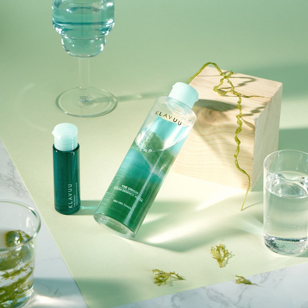 Klavuu The Origin Ocean Essence Water and Ocean Booster Shot toner bottles with blue and white packaging on a white background.