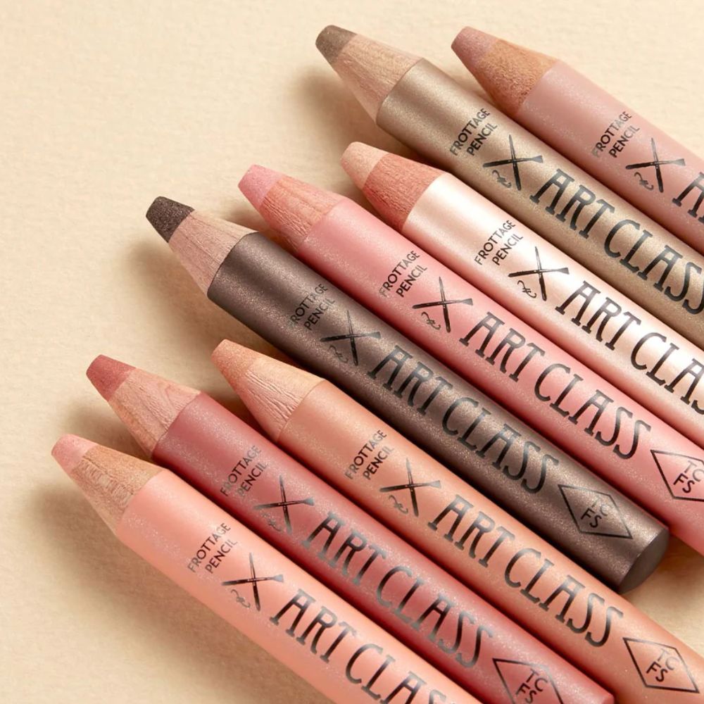 Too Cool For School Artclass Frottage Pencil eyeshadow in a soft, blendable shade showing the pencil and swatched on skin.