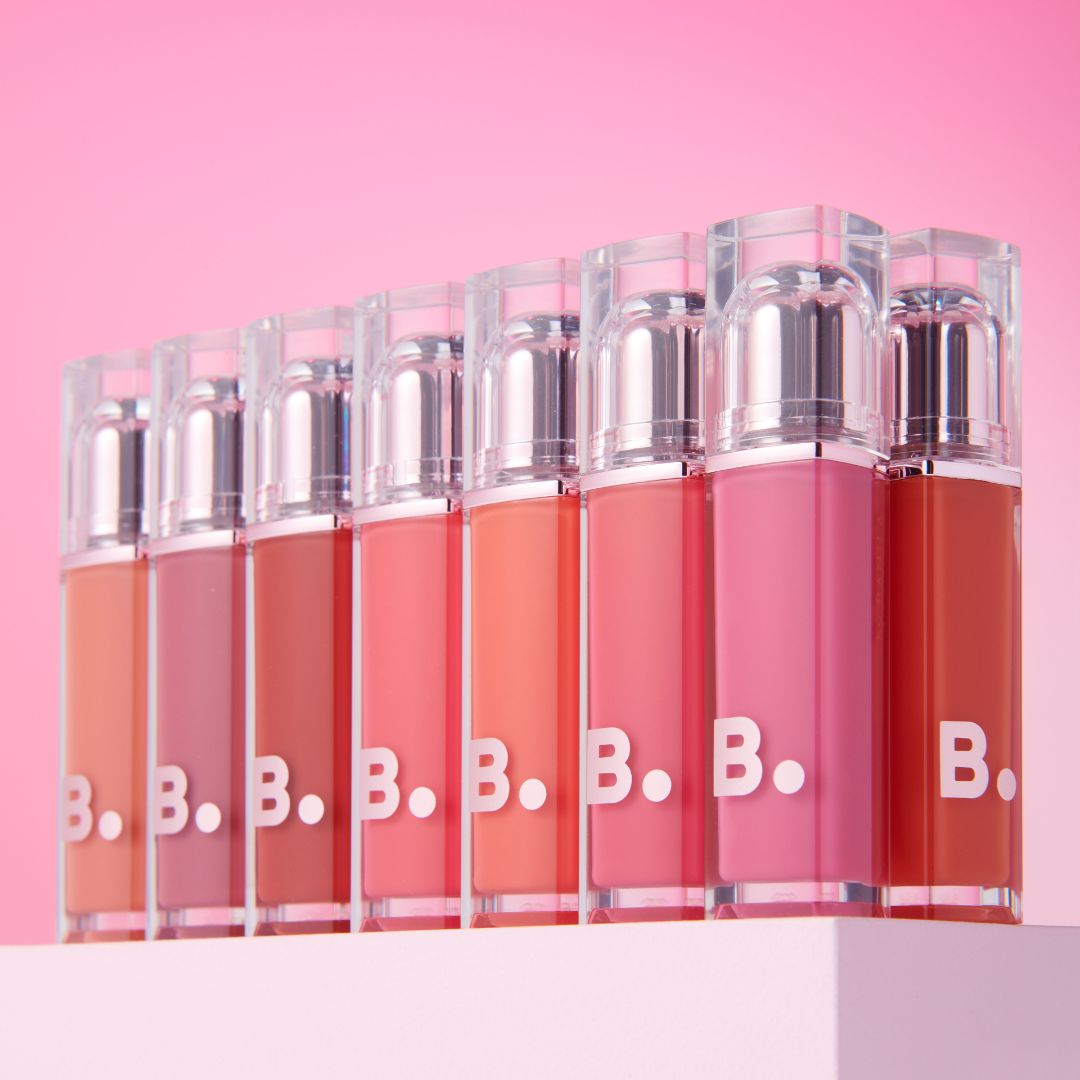 Banila Co Dew Glow Lip Tint showing a smooth, glossy pink lip with the tinted gloss applied for a natural, radiant look.