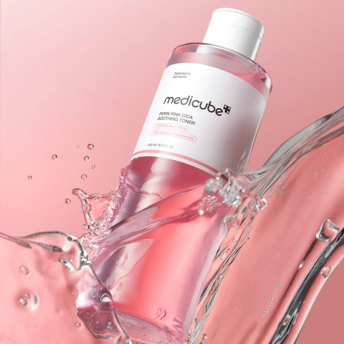 Medicube PDRN Pink Cica Soothing Toner 250ml bottle with soft pink liquid and calming label design.