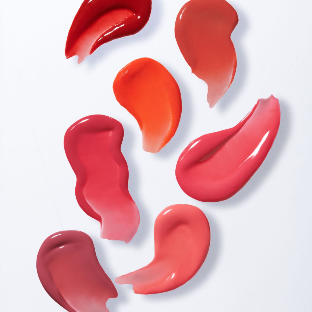 Banila Co Dew Glow Lip Tint in a sleek tube, showcasing the vibrant pink shade and glossy finish of the lip tint product.
