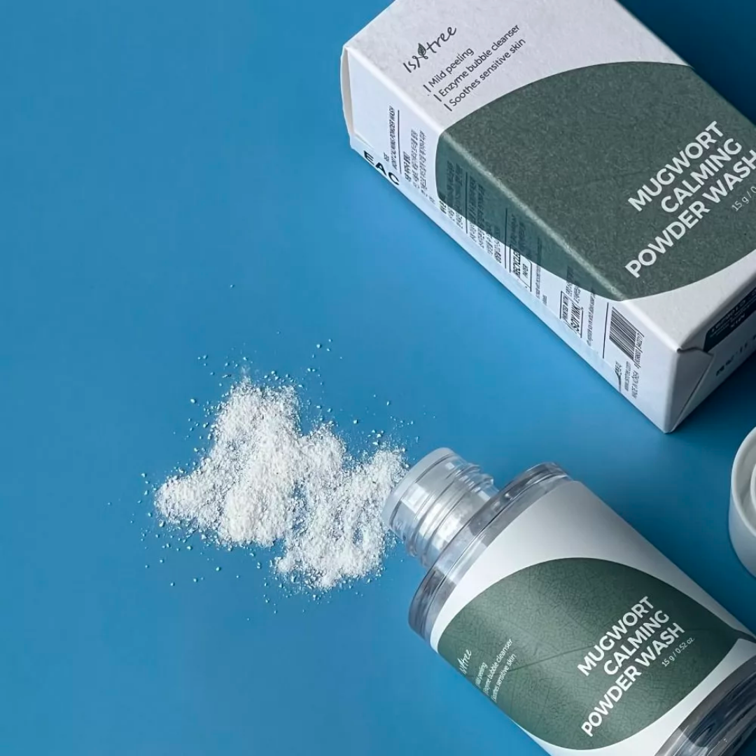 Isntree Mugwort Calming Powder Wash in a small 15g container, powdered cleanser with natural mugwort for soothing skin.