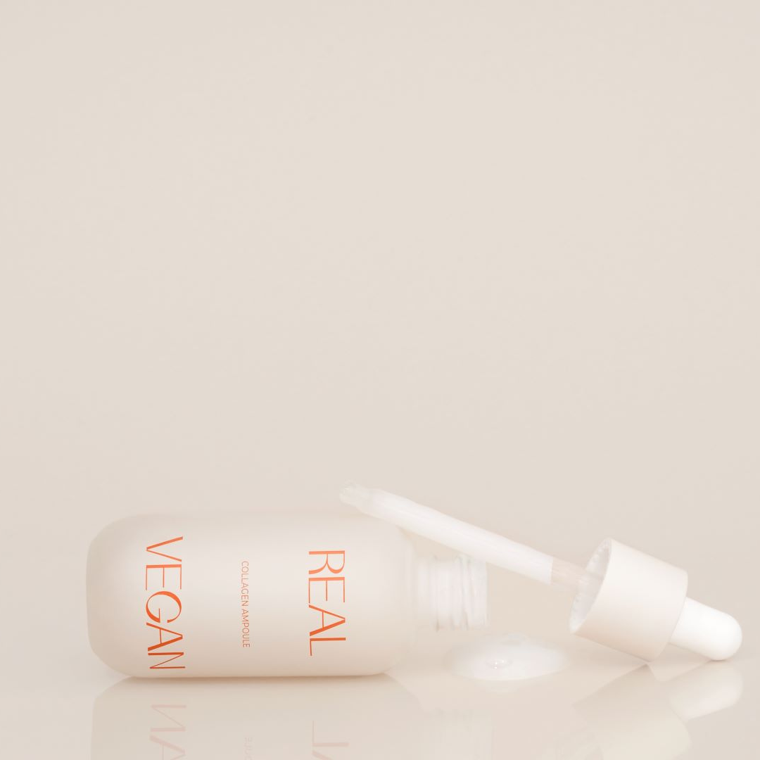 Klavuu Real Vegan Collagen Ampoule 30ml in a clear glass bottle with a white pump dispenser, showcasing the skincare product.