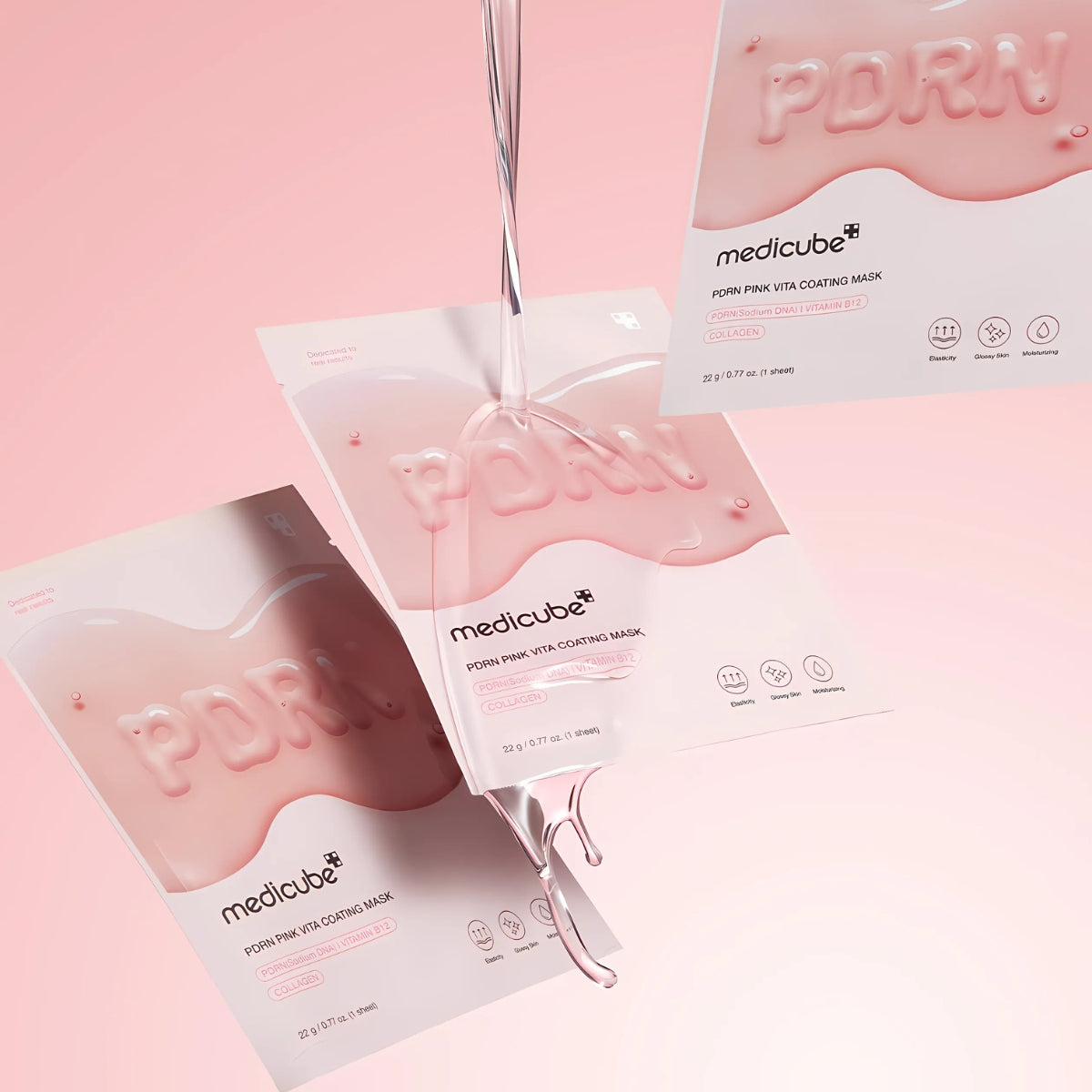 Medicube PDRN Pink Vita Coating Sheet Mask laid flat showing vibrant pink fabric with serum coating for skincare.