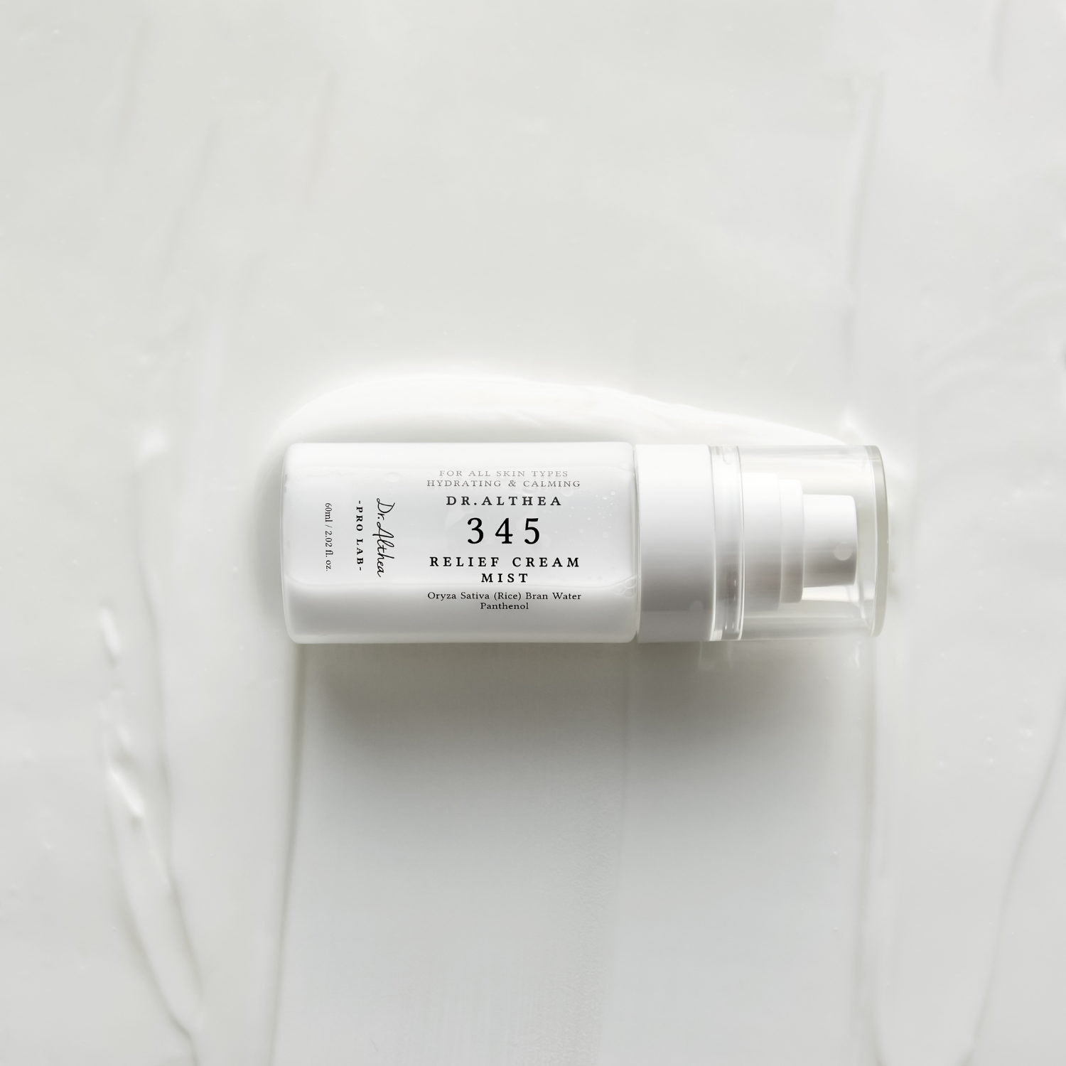 Dr. Althea 345 Relief Cream Mist 60ml, a facial mist with a soothing formula, displayed in a clear spray bottle.
