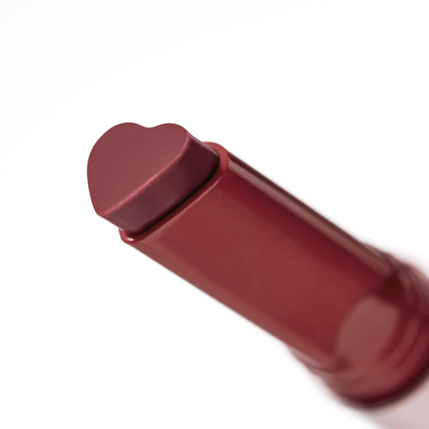 Peripera Heart Jam Glow Lipstick in vibrant pink shade, featuring a glossy finish and heart-shaped packaging.
