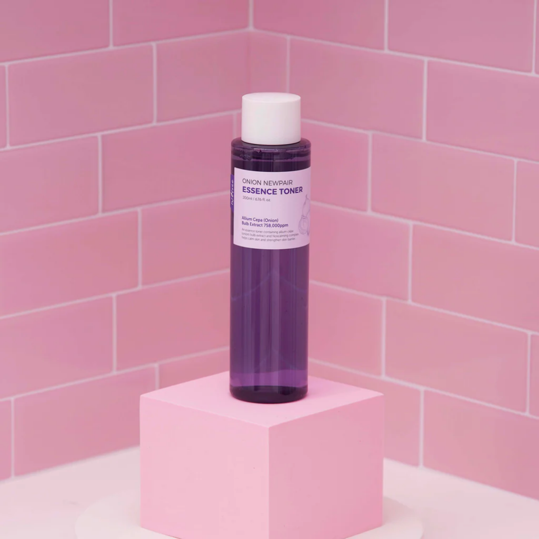 Isntree Onion Newpair Essence Toner bottle with label, 200 mL, displayed on a clean surface.