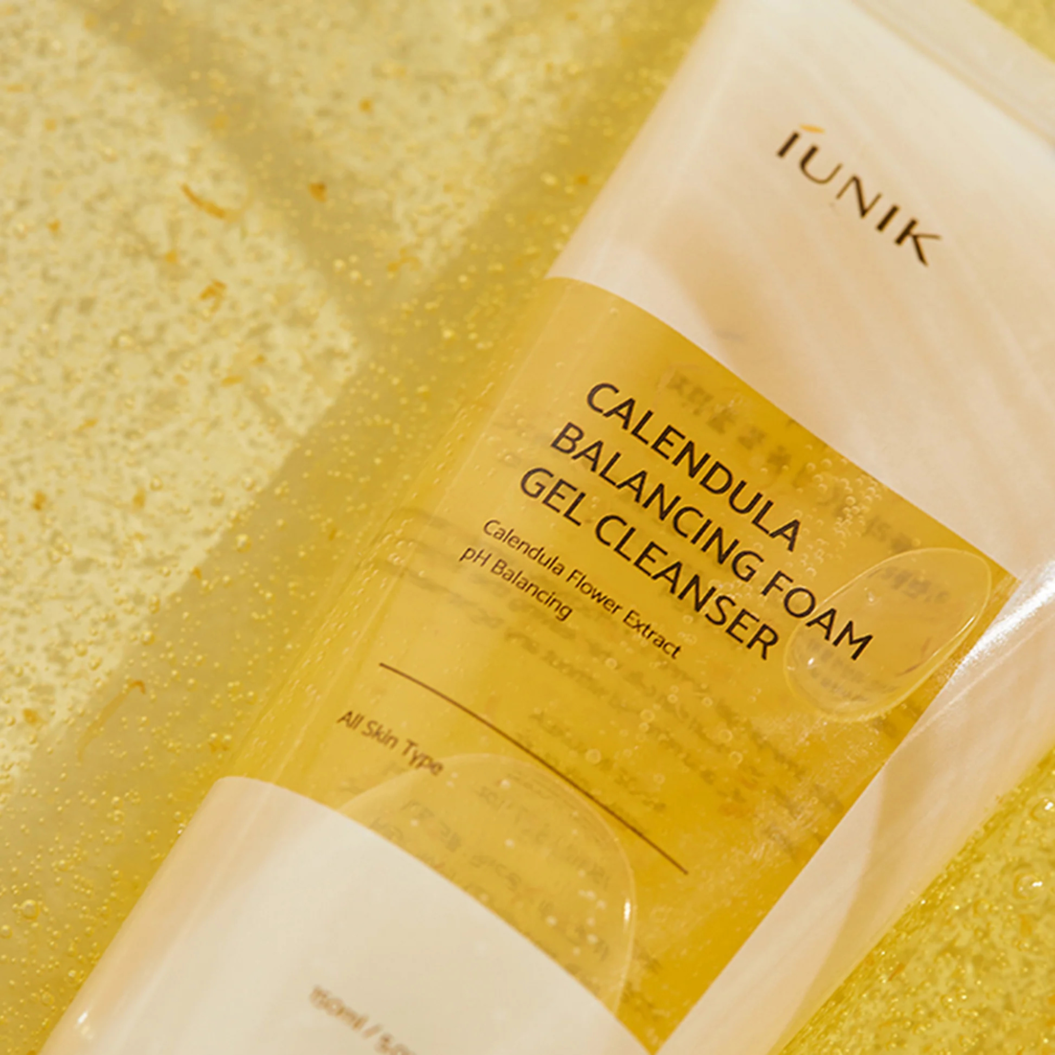 iUNIK Calendula Balancing Foam Gel Cleanser in 150ml bottle, showing the gel and foam cleanser product with packaging.