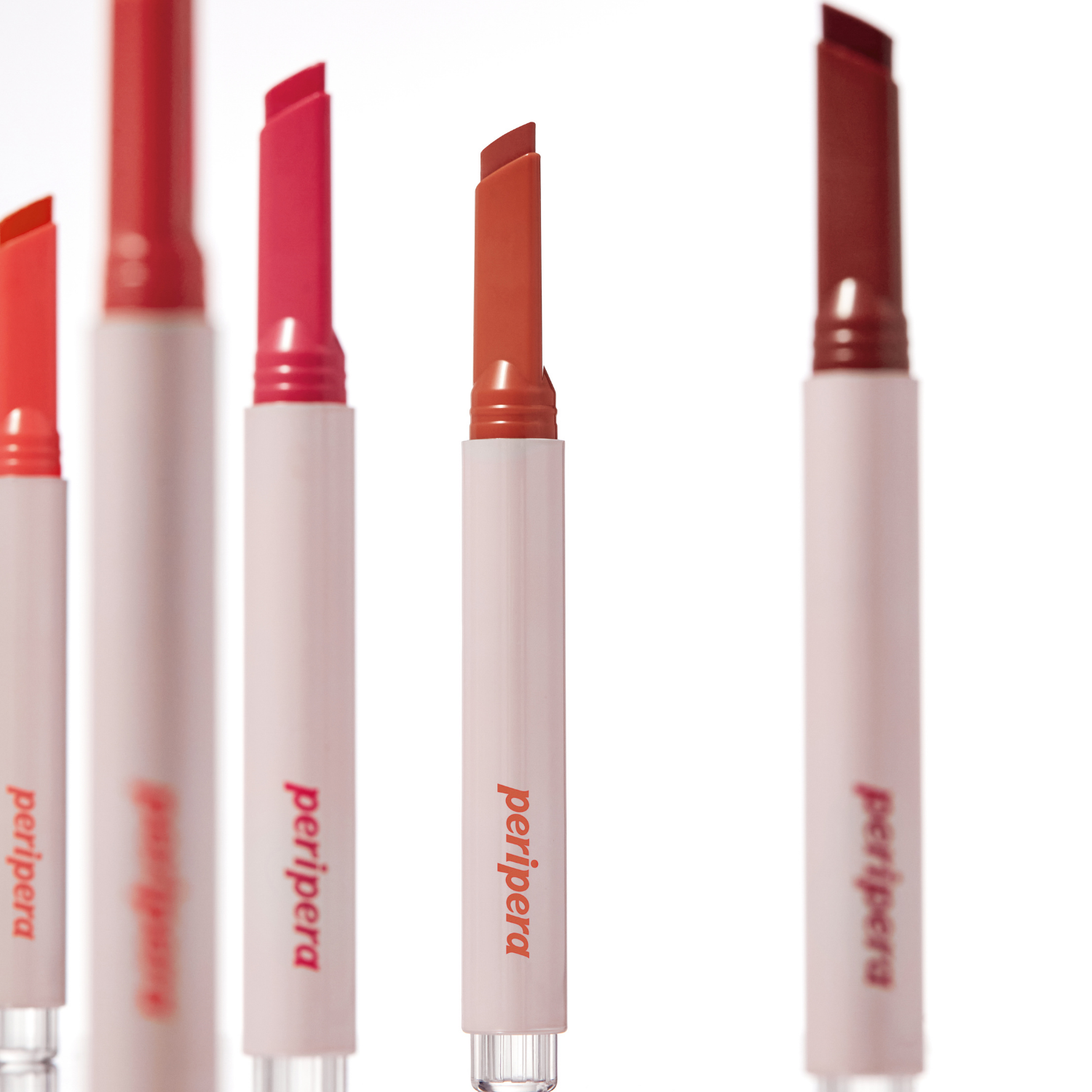 Peripera Heart Jam Glow Lipstick with a glossy pink lipstick bullet in a sleek tube.