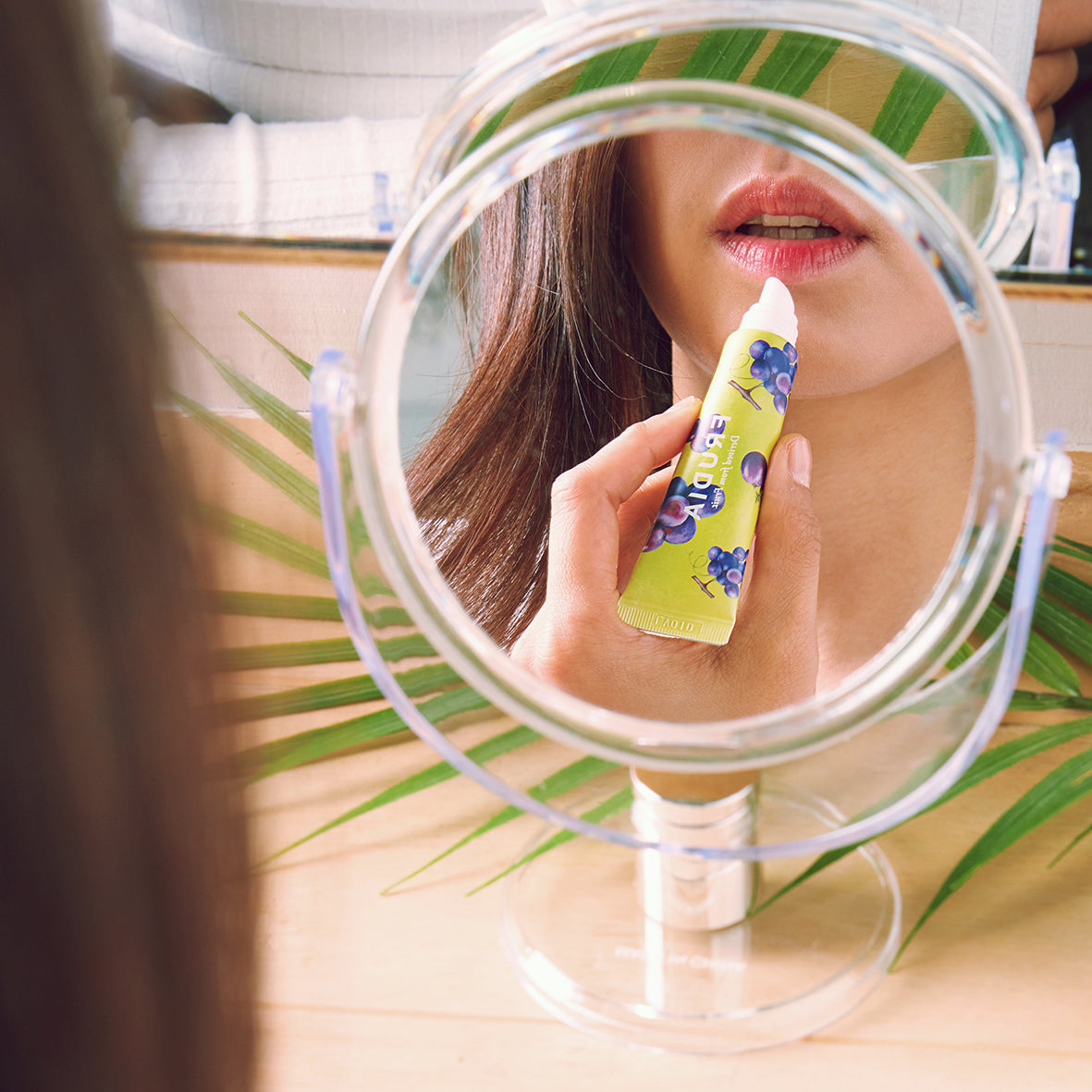 Frudia Grape Honey Chu Lip Essence 10g lip balm with nourishing grape and honey ingredients, smooth and hydrating lip treatment.