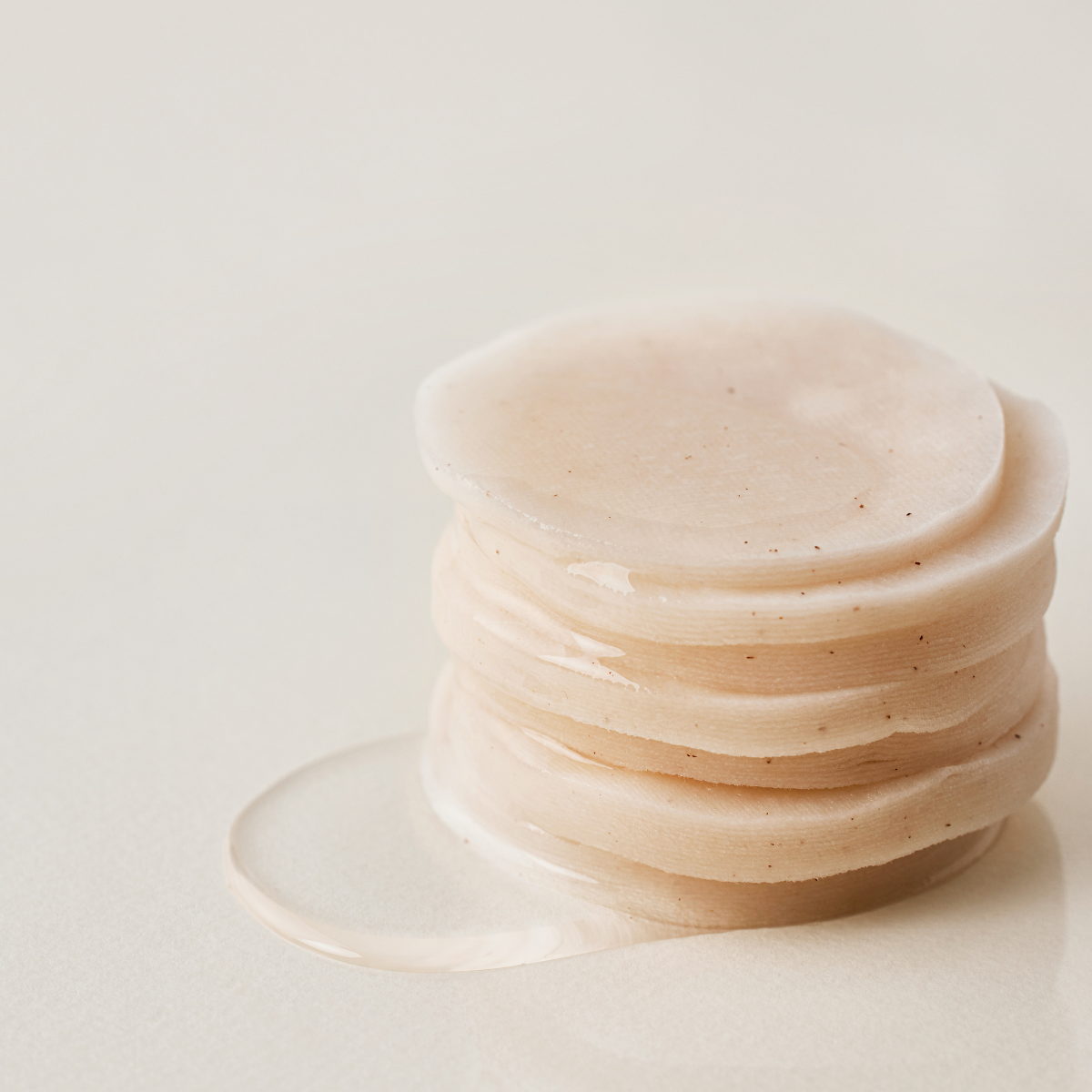 House of Hur Brightening Skin Prep Essence Pad, 70-piece toner pads with brightening formula, shown in a clear container.