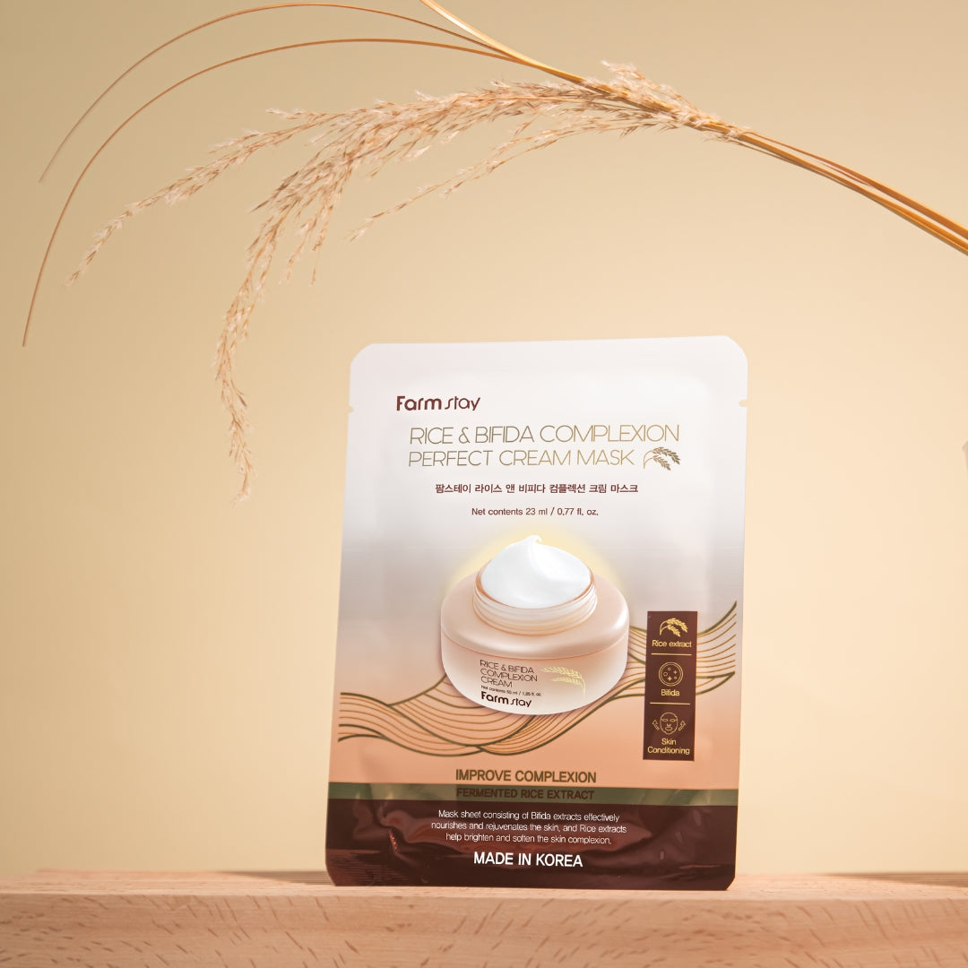 Farmstay Rice & Bifida Cream Sheet Mask box with 10pcs, featuring nourishing skincare ingredients and soft fabric masks.