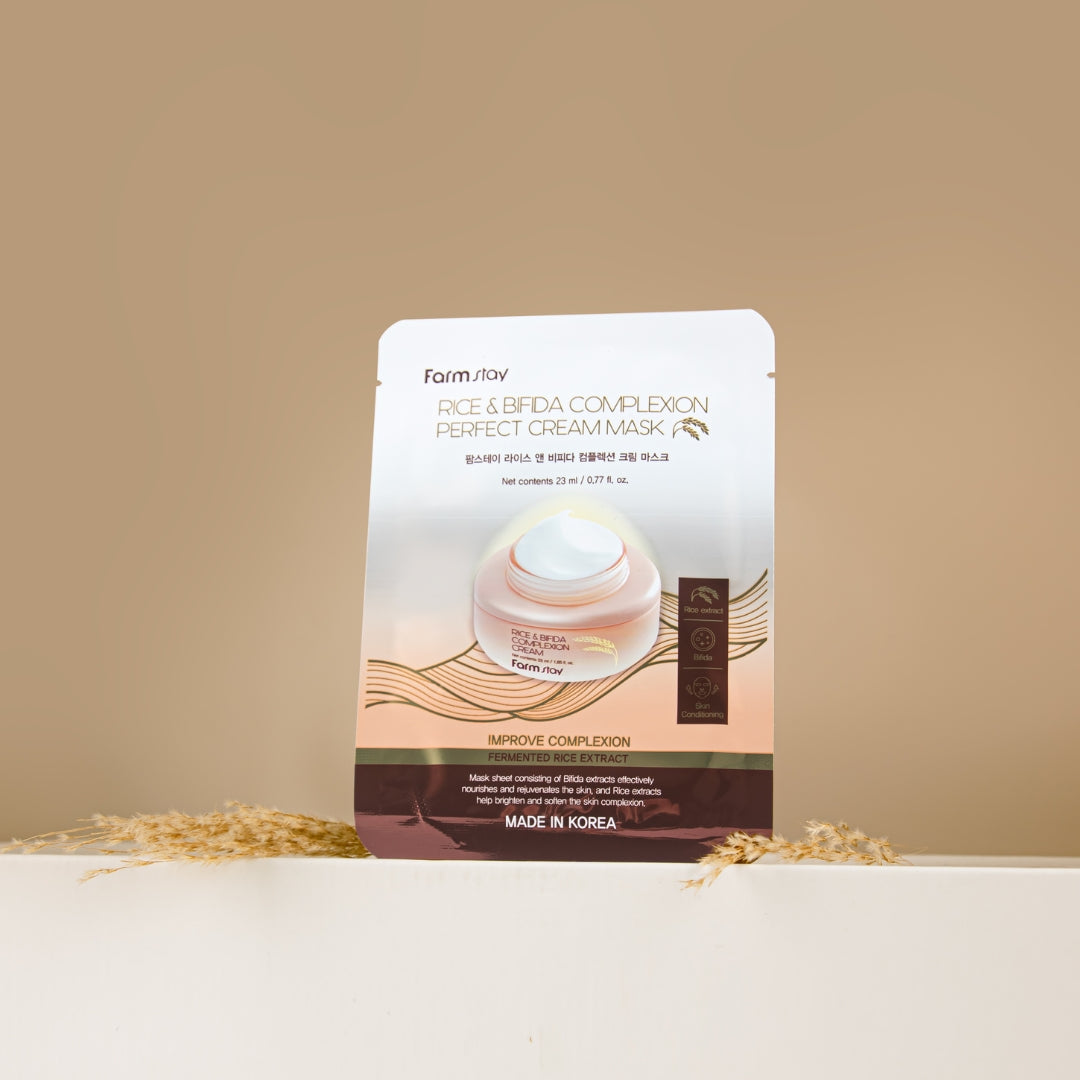 Farmstay Rice & Bifida Cream Sheet Mask box with 10pcs, featuring nourishing skincare sheets for hydration and skin renewal.
