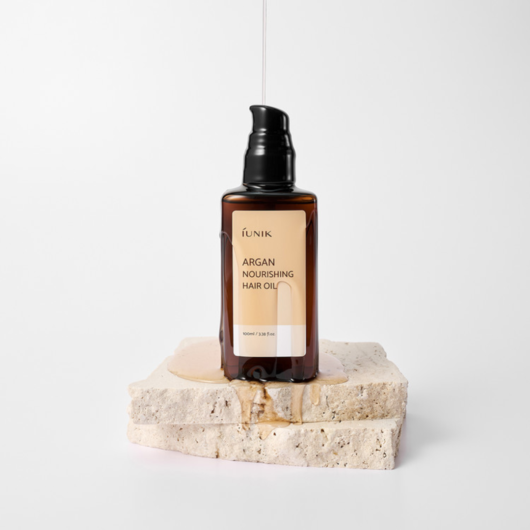 iUNIK Argan Nourishing Hair Oil 100ml bottle, conditioner and treatment for shiny, healthy hair, with argan oil.
