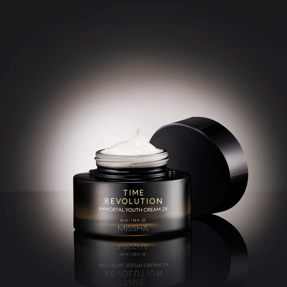 Missha Time Revolution Immortal Youth Cream 2X face moisturizer in a 50ml jar with a sleek design