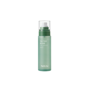 Farmstay Tea Tree Biome Calming Mist 120ml face mist bottle with mist spray nozzle and label showing tea tree imagery.