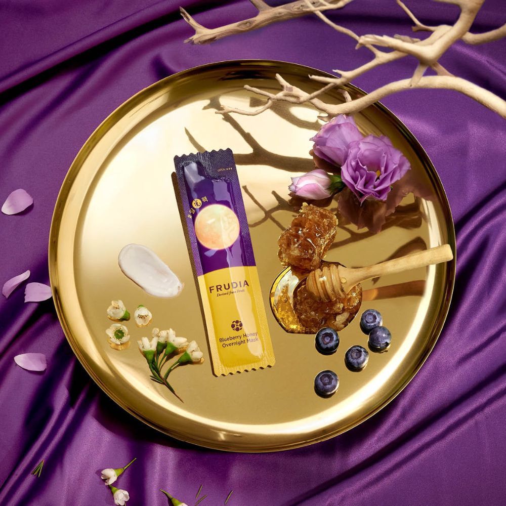 Frudia Blueberry Honey Overnight Mask set with 20 small 5ml leave-on sleeping masks in individual cups.
