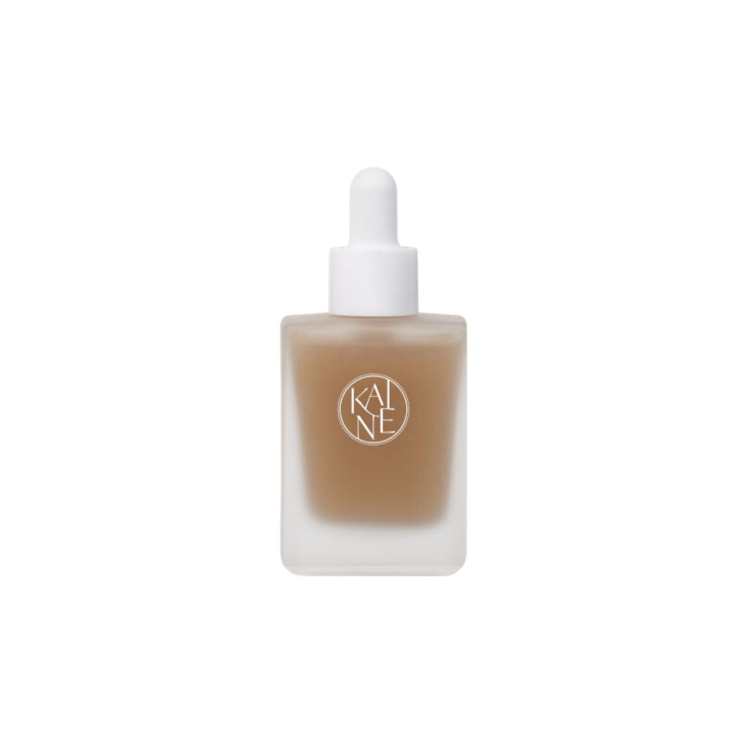 Kaine Kombu Barrier Ampoule 30ml in a clear glass bottle with a white pump dispenser, designed for skin hydration and protection.