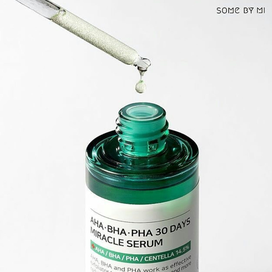 Some By Mi AHA BHA PHA 30 Days Miracle Serum in a 50ml bottle, shown with the serum's sleek packaging and dropper applicator.