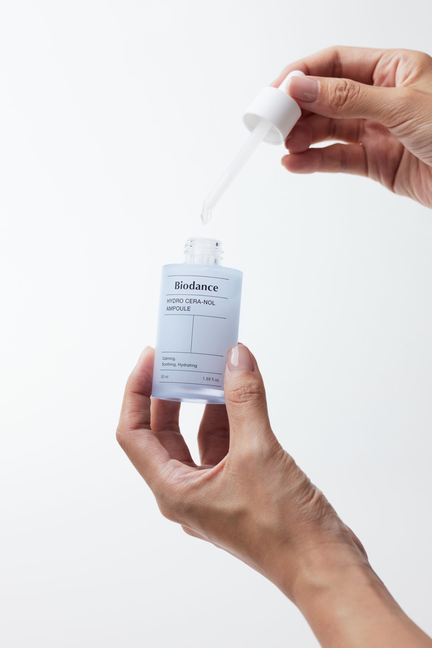 Biodance Hydro Cera-nol Ampoule 50ml in a clear glass bottle with dropper, showcasing hydrating skincare serum.