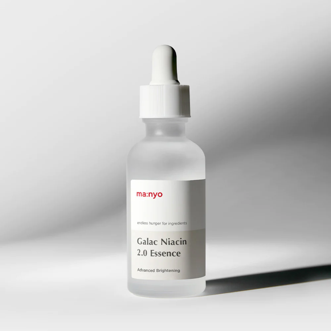Ma:nyo Galac Niacin 2.0 Essence 50ml bottle, clear liquid essence in a sleek white and gold packaging, ready for skincare use.