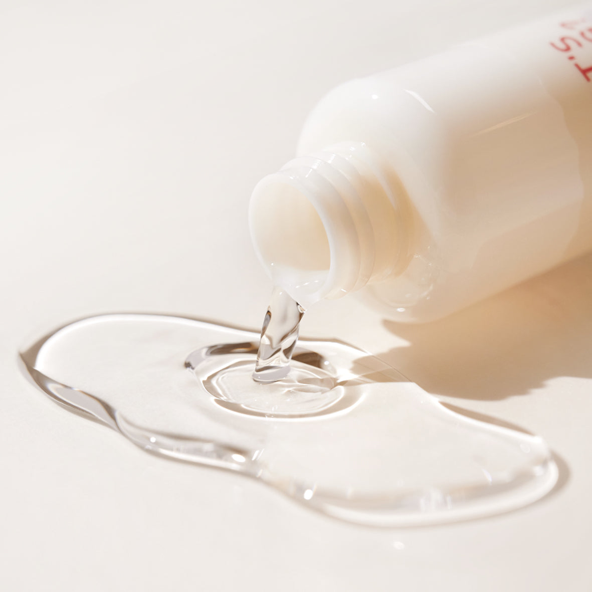 Frudia What's Wrong Help AC Clear Body Mist 150ml bottle with spray nozzle, lying on a white surface.