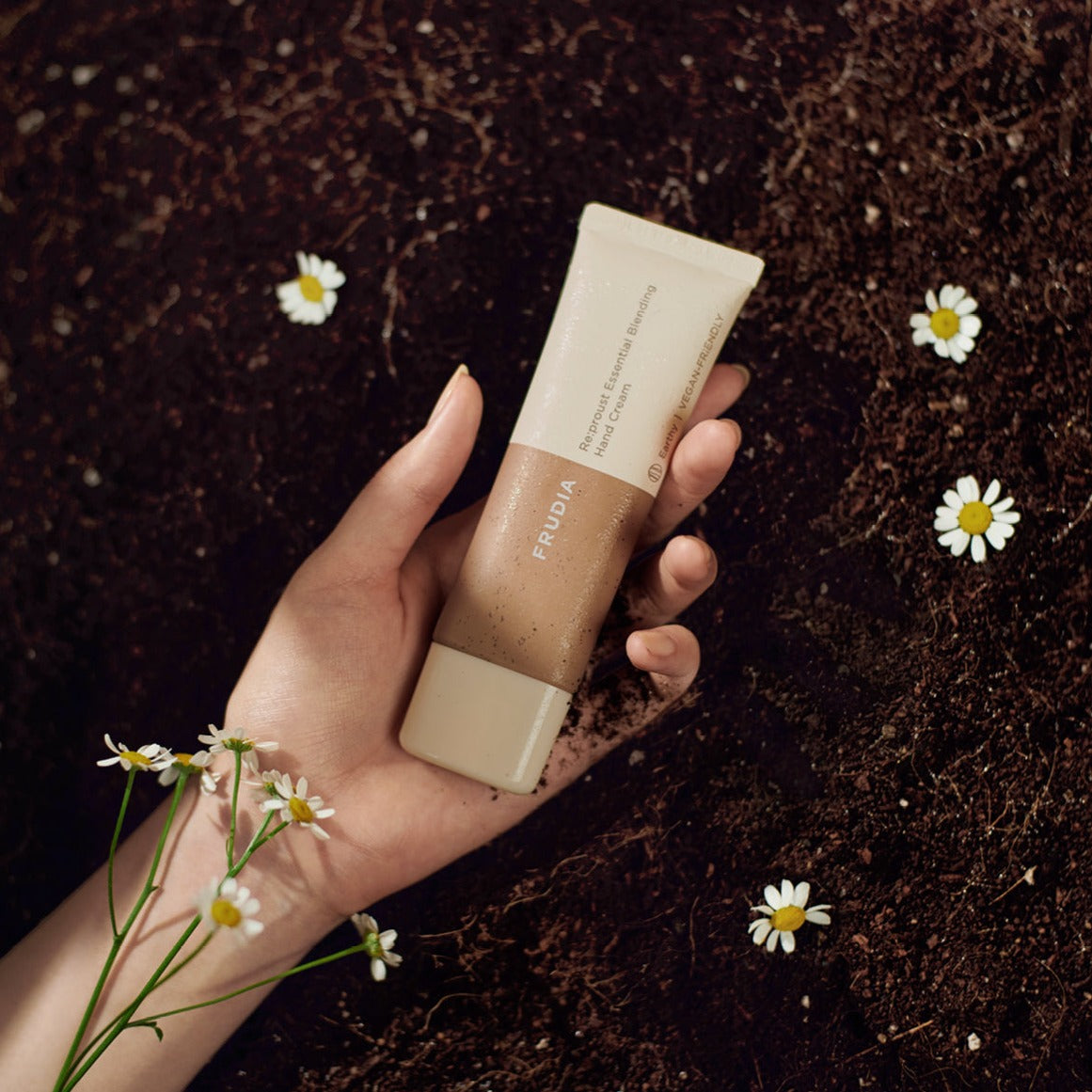 Frudia Re:proust Essential Blending Hand Cream Earthy 50g with natural, nourishing formula in a sleek tube.