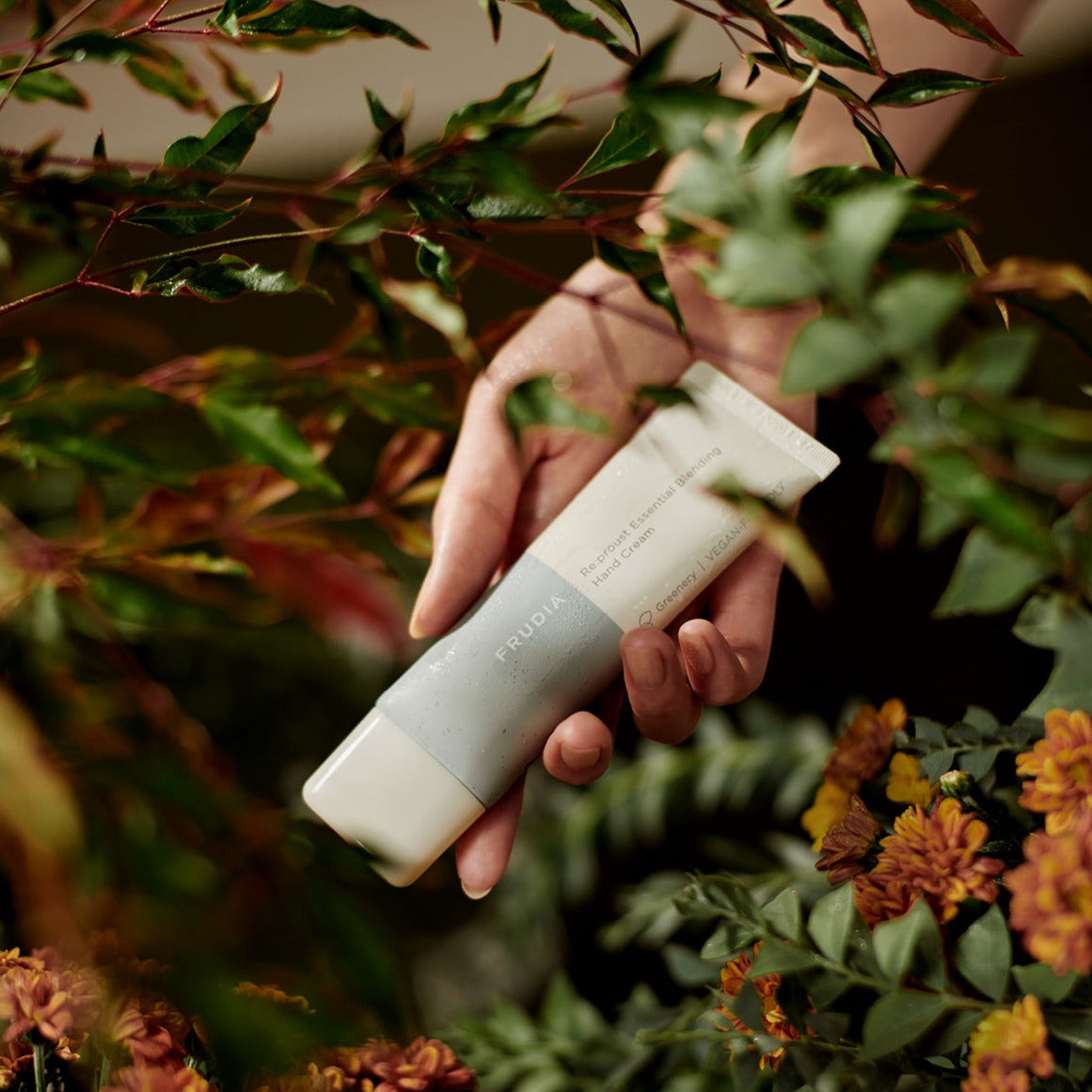Frudia Re:proust Essential Blending Hand Cream Greenery 50g, soft cream with natural green plant ingredients for nourishing hands.