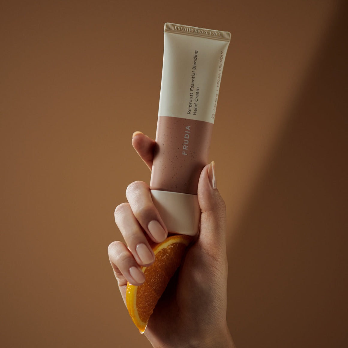 Frudia Re:proust Essential Blending Hand Cream Dazzling 50g with smooth, nourishing texture and elegant packaging.