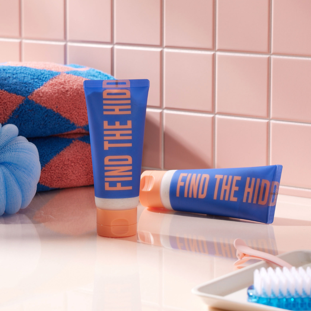Dear Doer The Hidden Scrub body wash and scrub with natural ingredients, showing a sleek bottle with a pump dispenser.