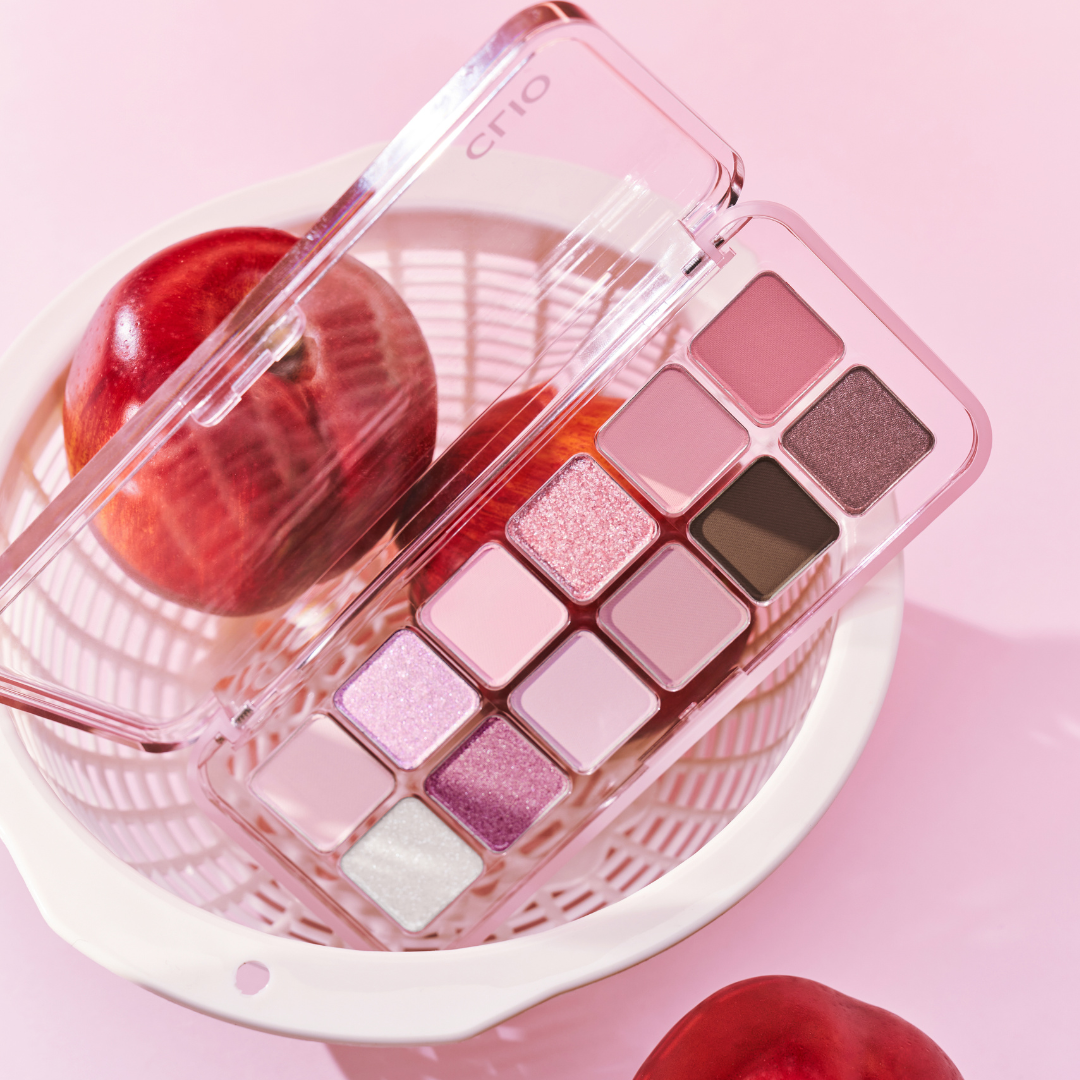 Clio Pro Eye Palette Air with vibrant fruit-inspired eyeshadow shades, featuring colorful pans in a sleek eyeshadow palette.