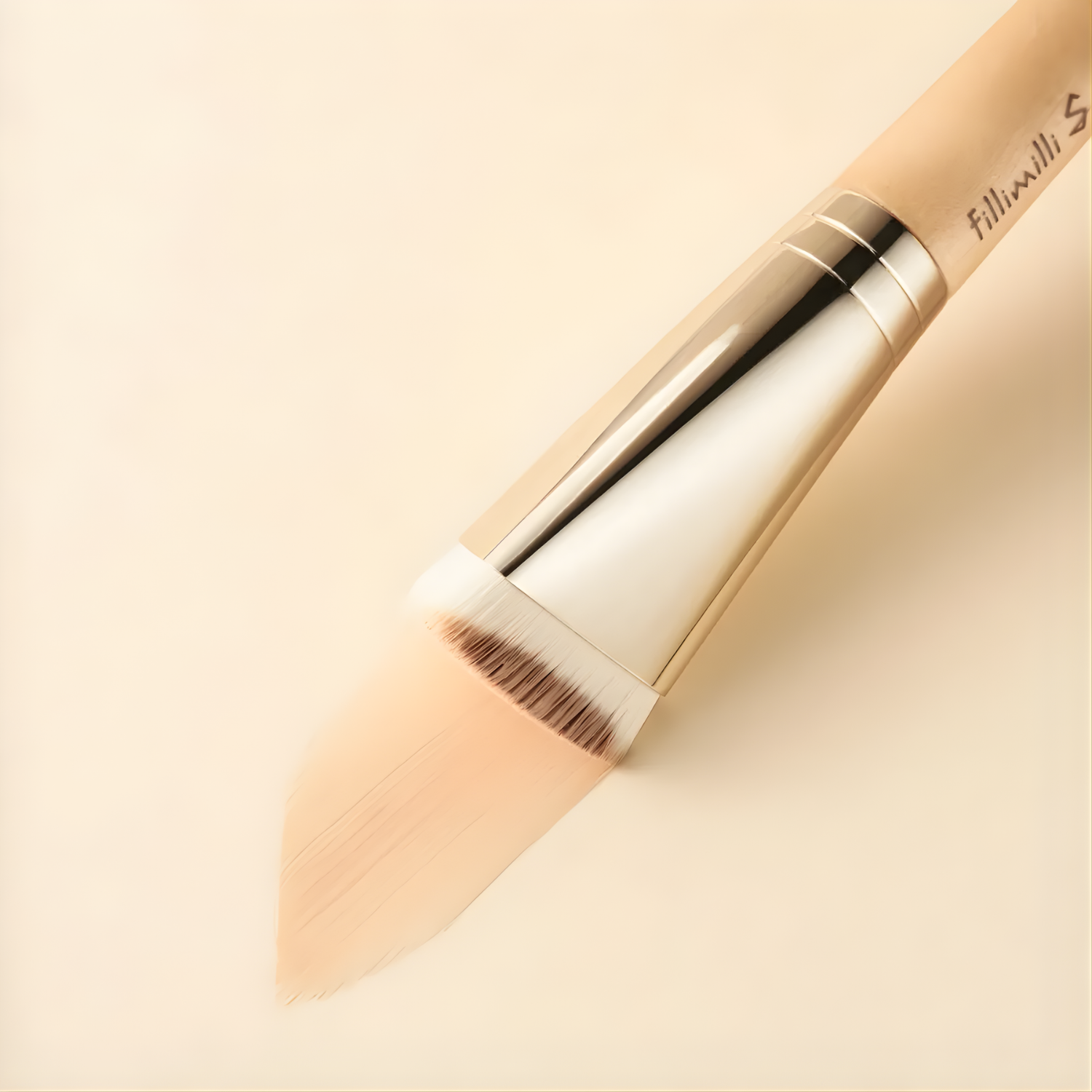 Fillimilli Smooth Skin Filter Foundation Brush 827 makeup brush with soft bristles for seamless foundation application.