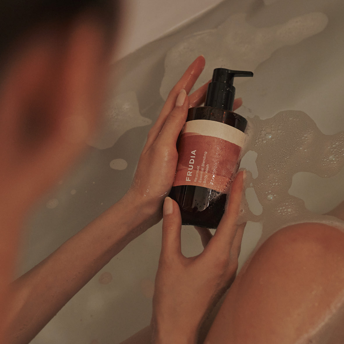 Frudia Re:proust Essential Blending Body Wash and Scrub in 300ml bottle with a luxurious, moisturizing formula.