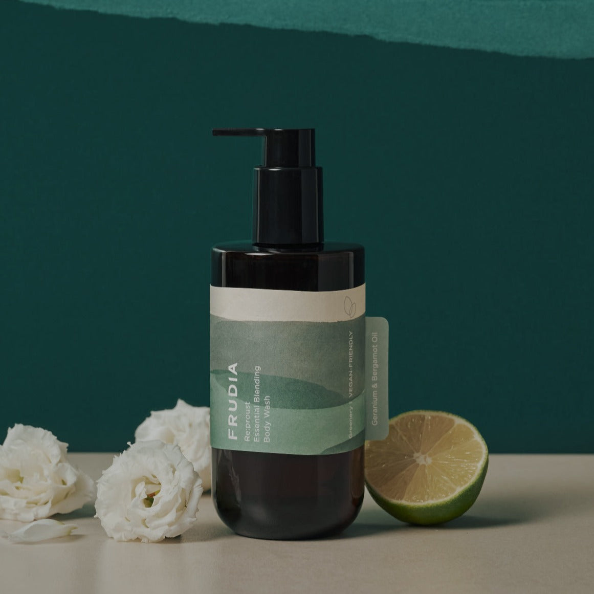Frudia Re:proust Essential Blending Body Wash with greenery scent, showing a 300ml bottle of body wash and scrub.