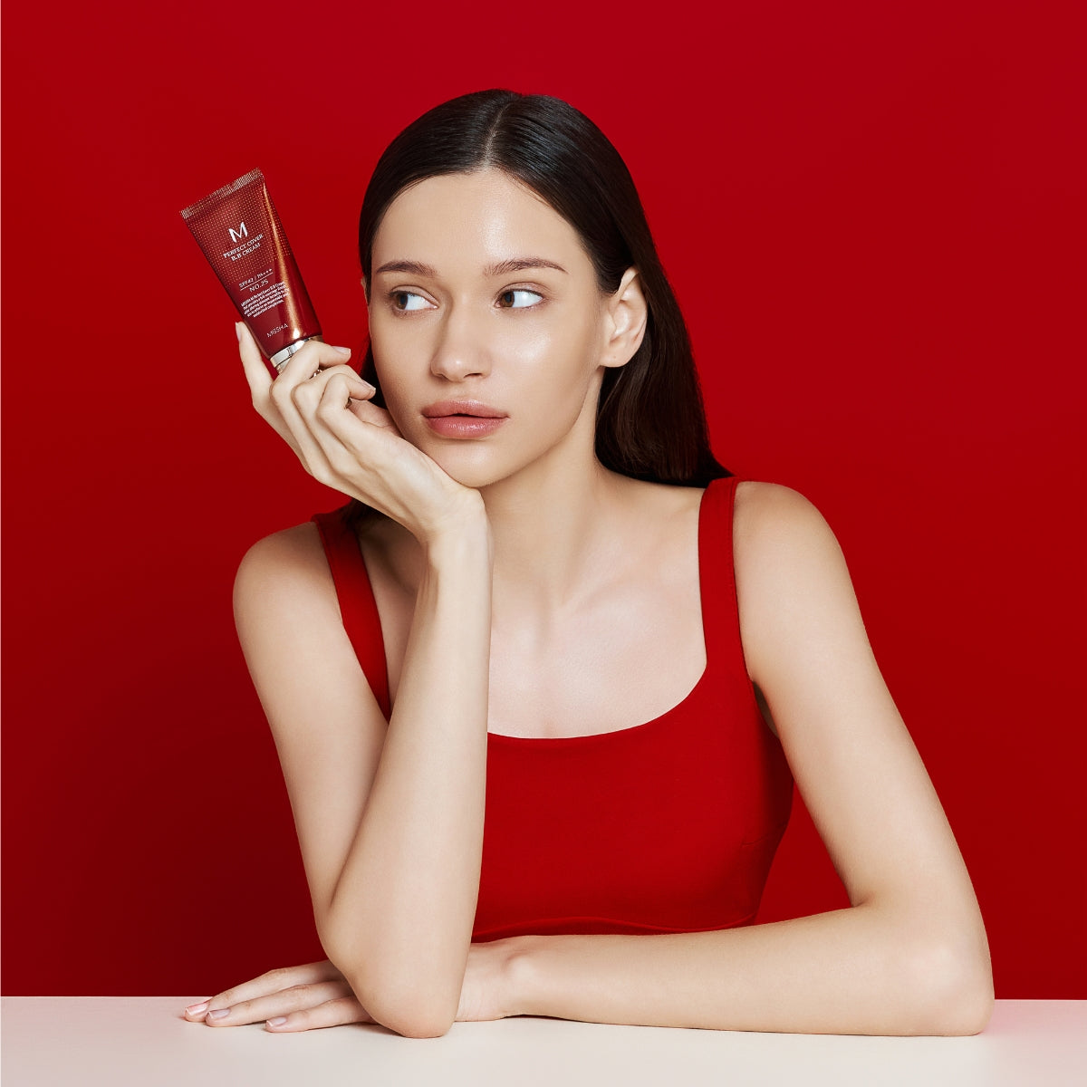 Missha M Perfect Cover BB Cream EX 50ml in a tube, showcasing its smooth texture and beige shade suitable for even skin tones.