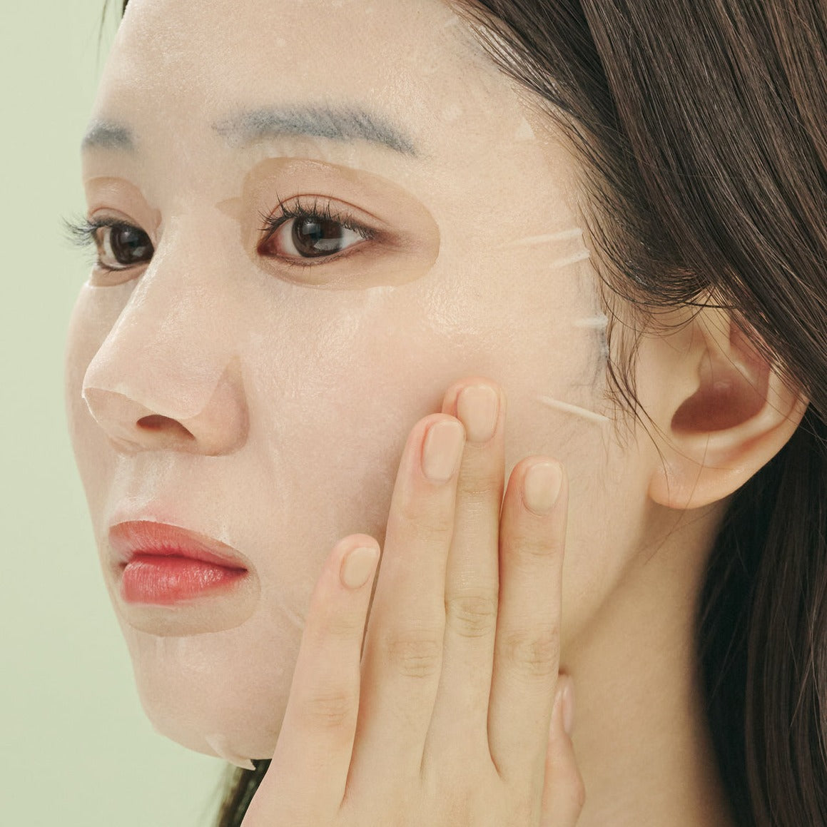Frudia Avocado Relief Cream Mask sheet masks in a box, featuring ten individually packaged sheet masks with avocado extract for soothing skin.