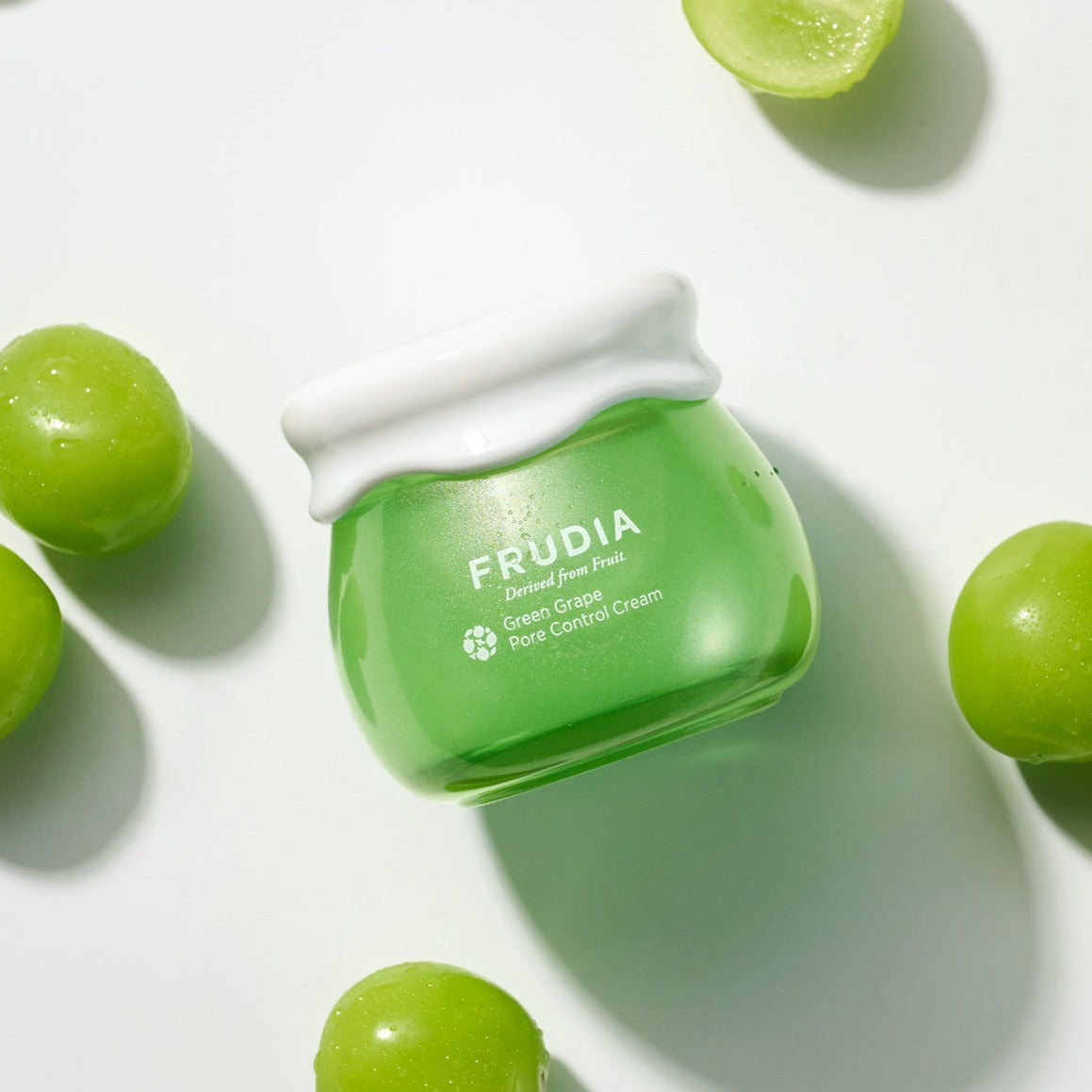 Frudia Green Grape Pore Control Cream, a face moisturizer with a smooth, green grape-infused formula for pore tightening.
