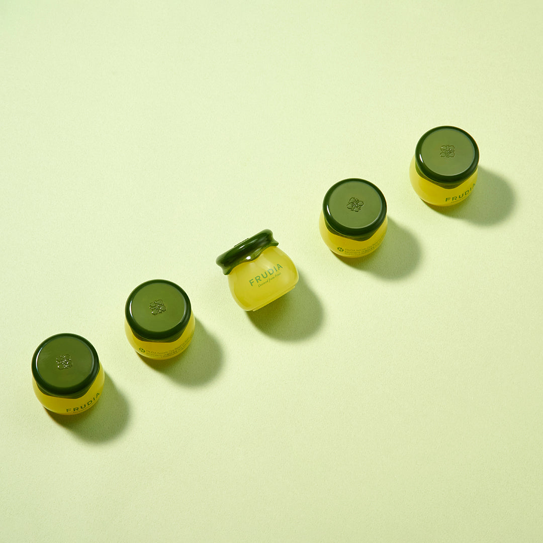 Frudia Avocado Cica Relief Lip Balm 10ml showing the balm tube with green avocado and cica ingredients for soothing lips
