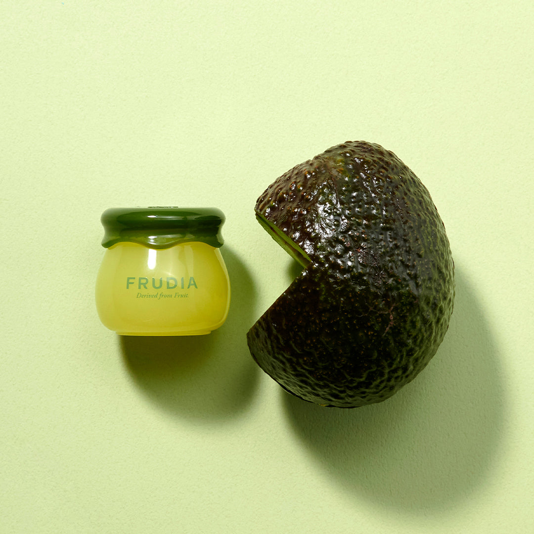 Frudia Avocado Cica Relief Lip Balm 10ml in a sleek tube, designed to nourish and soothe lips with avocado and cica ingredients.