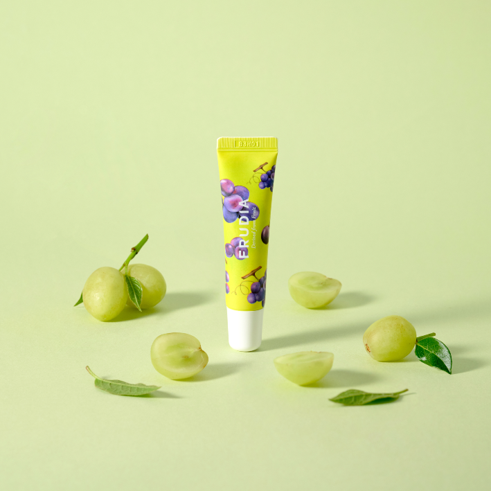 Frudia Grape Honey Chu Lip Essence 10g lip balm with grape and honey ingredients, smooth, nourishing lip treatment in a small jar